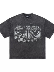 Vintage graphic relaxed fit t-shirt in dark gray cotton with crew neck and abstract print.