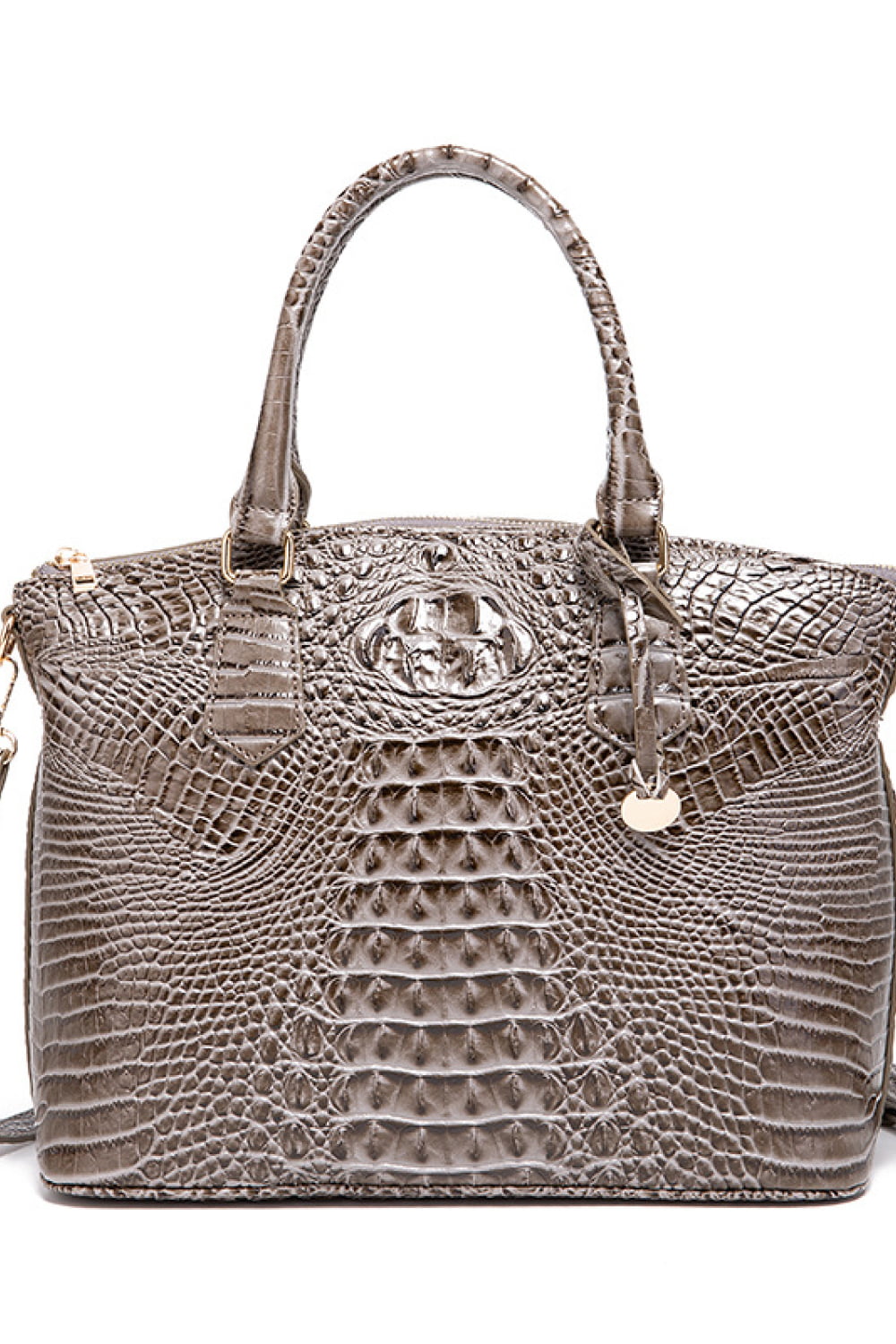 Crocodile embossed satchel bag in taupe with top handle and gold hardware detail.