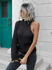 Black asymmetric cable knit sweater with one long sleeve and one cold shoulder.