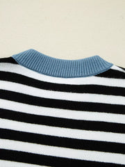 Colorblock striped knit sweater with crew neck and blue ribbed collar detail.