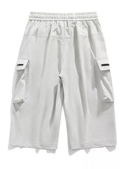 Light gray cargo shorts with elastic waistband and zippered pockets.