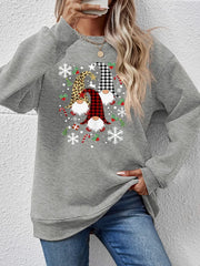 Grey raglan sweatshirt with festive gnome graphic and snowflakes.