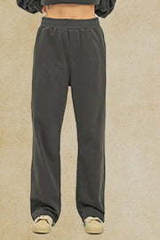 Dark gray seamed lounge trousers with a relaxed fit and elastic waistband.