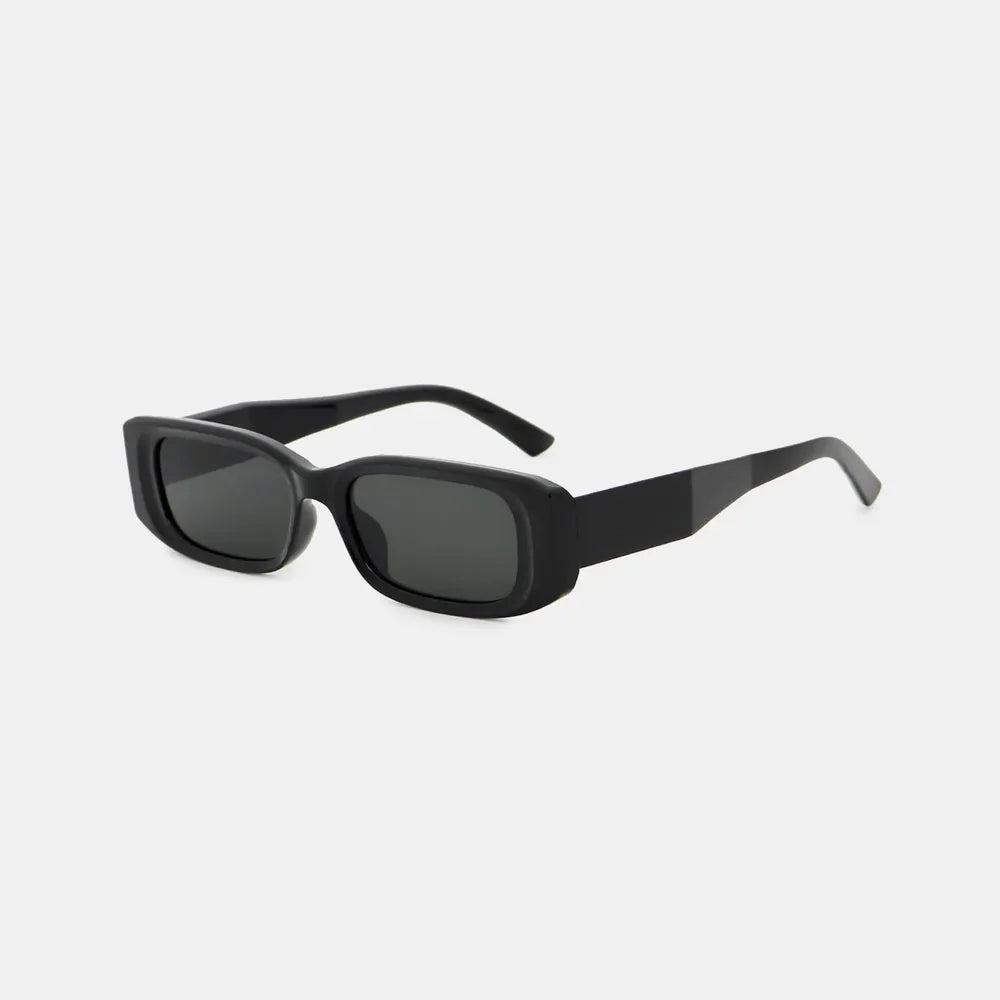 Chunky rectangular sunglasses in black with dark lenses and thick frames.