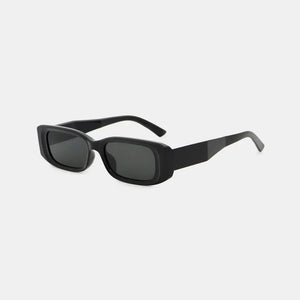 Chunky rectangular sunglasses in black with dark lenses and thick frames.