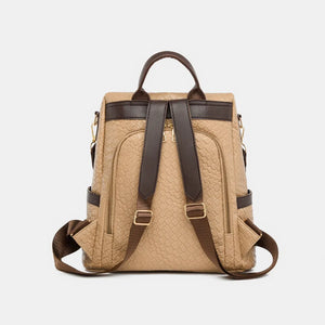 Tan woven faux leather convertible backpack with dark brown trim and straps.