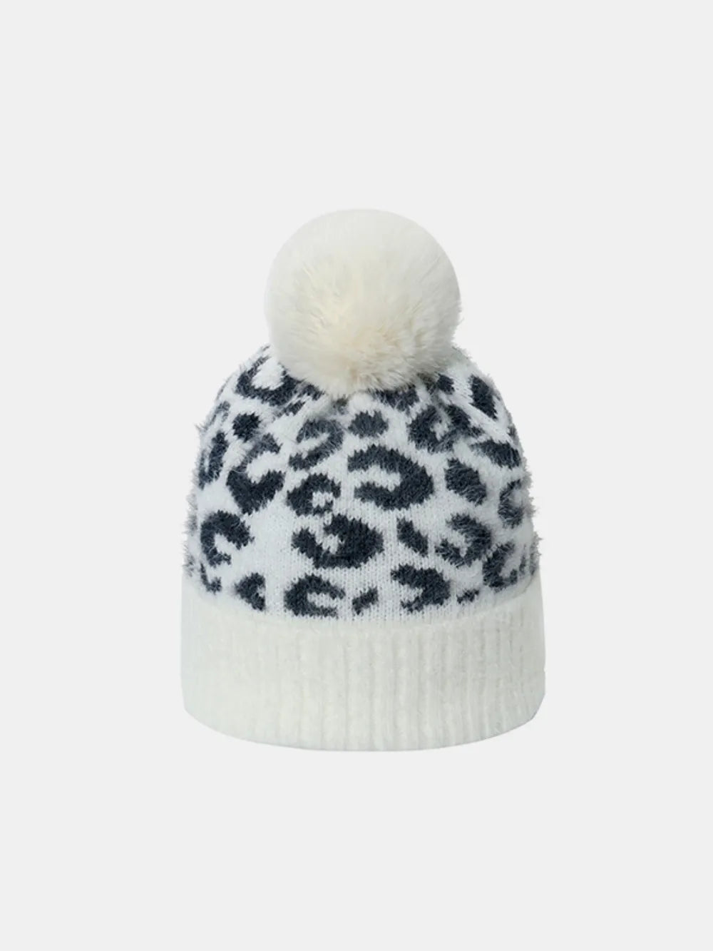 White acrylic beanie with black leopard print and white pom pom.
