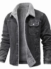 Men's black sherpa-lined denim jacket with button-up front and chest pockets.