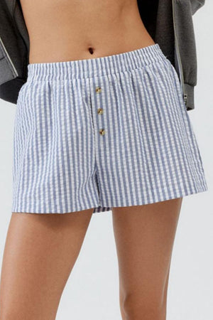 Seersucker boxer shorts in light blue and white stripe with button fly and elastic waist.
