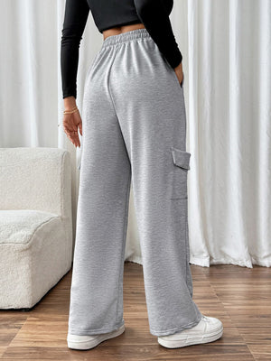 Light gray wide-leg sweatpants with cargo pockets and an adjustable waist.