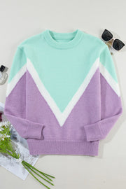 Chevron colorblock knit pullover sweater in lavender and mint green with white accents.