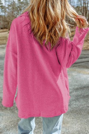 Hot Pink shacket with textured fabric and raw-edge detailing.