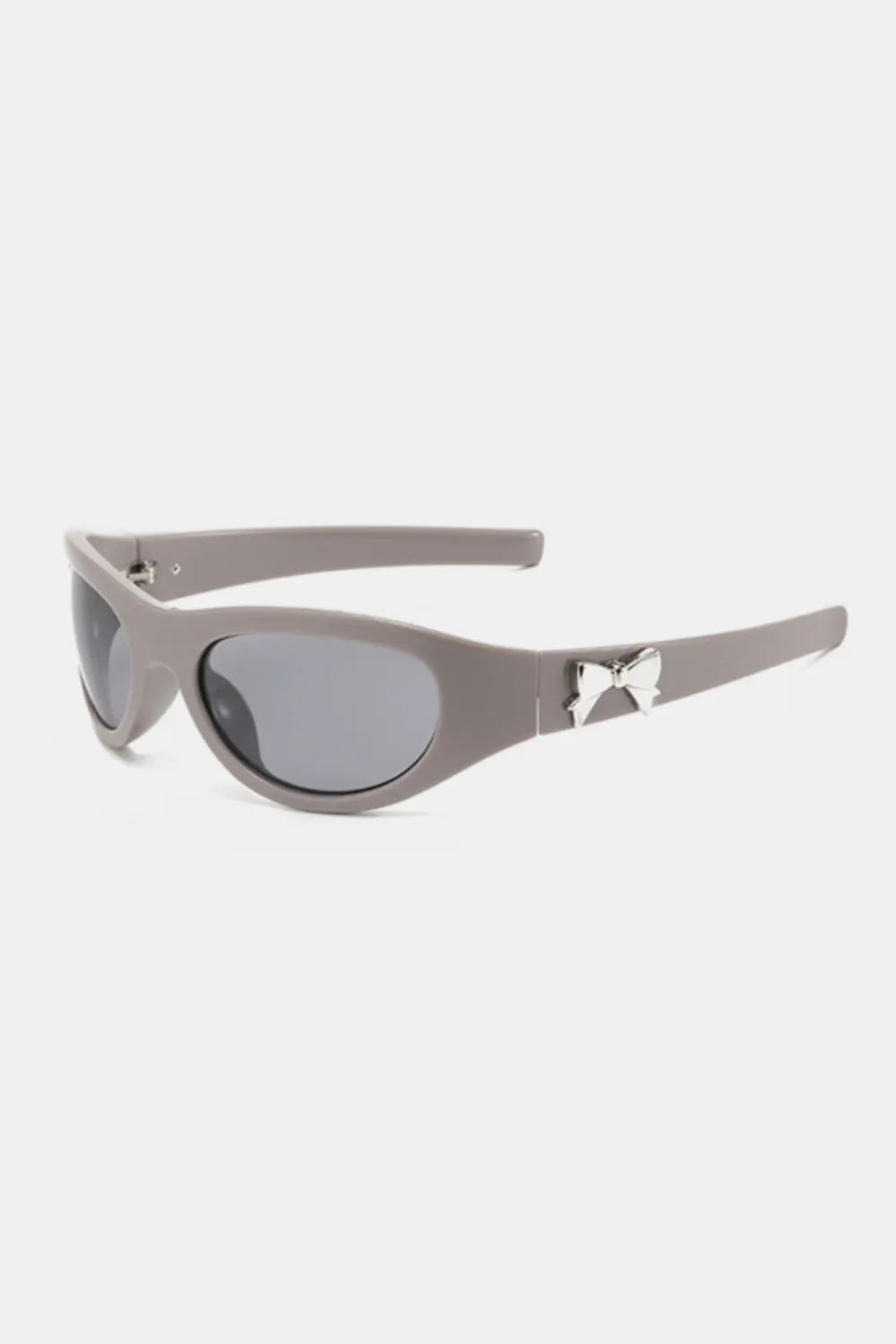 Gray sporty shield sunglasses with silver bow embellishment