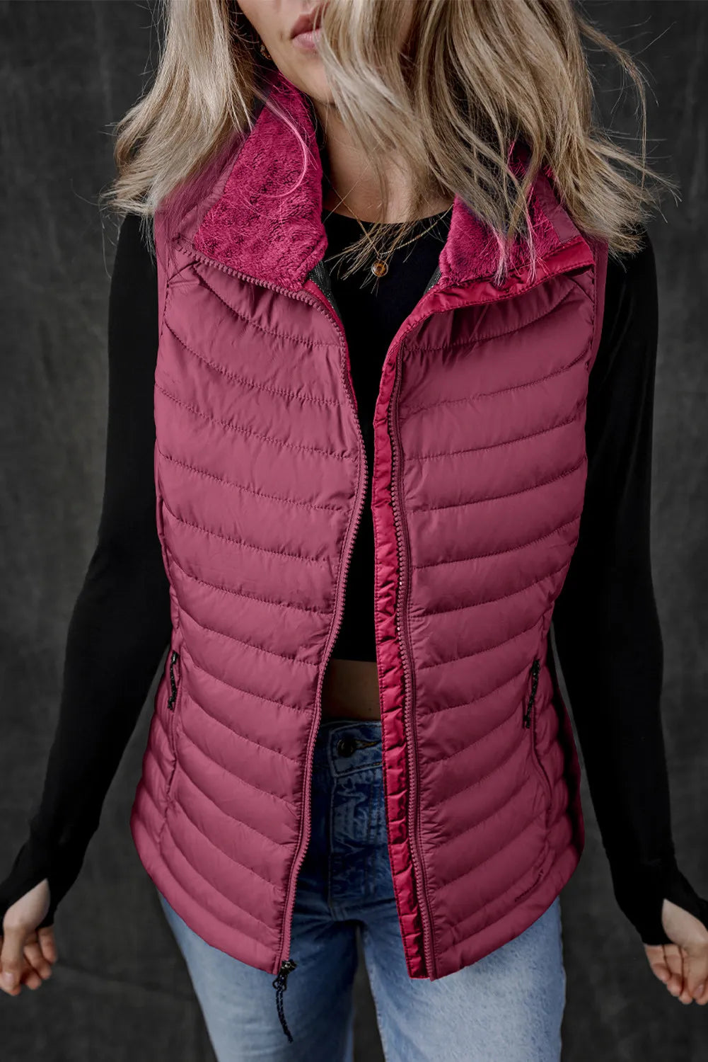 Quilted puffer vest in deep purple with a textured fleece collar and full zip front.