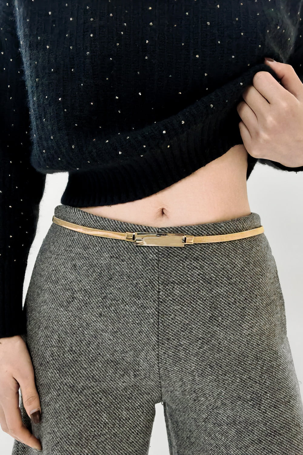 Slimline gold-tone metal waist belt with rectangular buckle detail