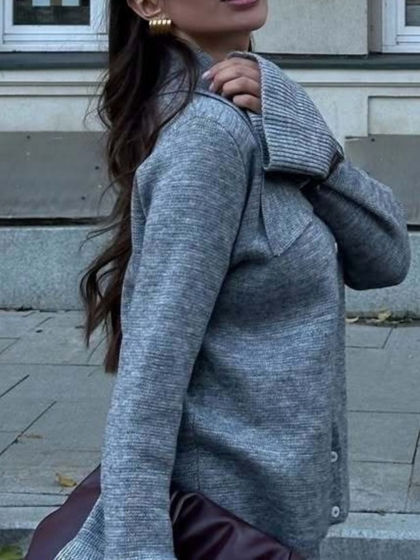 Grey ribbed acrylic button-down cardigan with a collar detail.