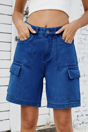 Medium wash denim utility shorts with large cargo pockets and contrast stitching.