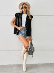 Black sleeveless denim blazer vest with lapel collar and button front.