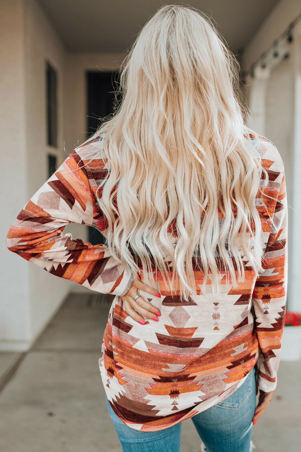 Southwestern print button-down blouse in multicolor with long sleeves and a casual fit.