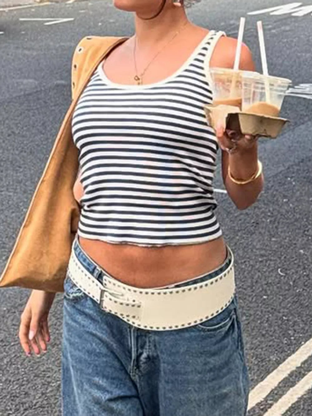 Ribbed striped scoop neck tank top with a cropped fit.