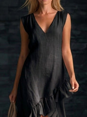 Black linen dress with V-neck, sleeveless, and ruffled high-low hem.