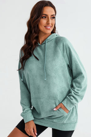 Textured raglan sleeve hoodie in Gum Leaf green with drawstring hood and front pocket.
