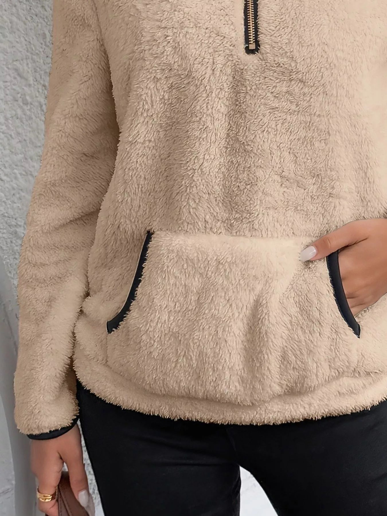 Khaki fleece quarter zip pullover with front pocket and black trim