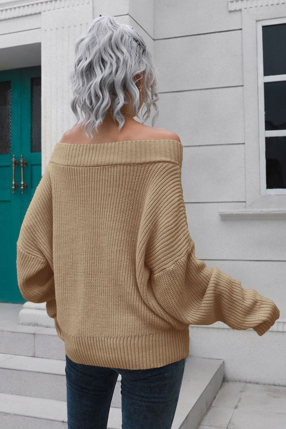 Camel ribbed off-shoulder sweater with balloon sleeves.