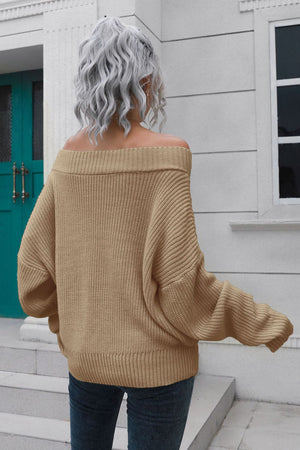 Camel ribbed off-shoulder sweater with balloon sleeves.