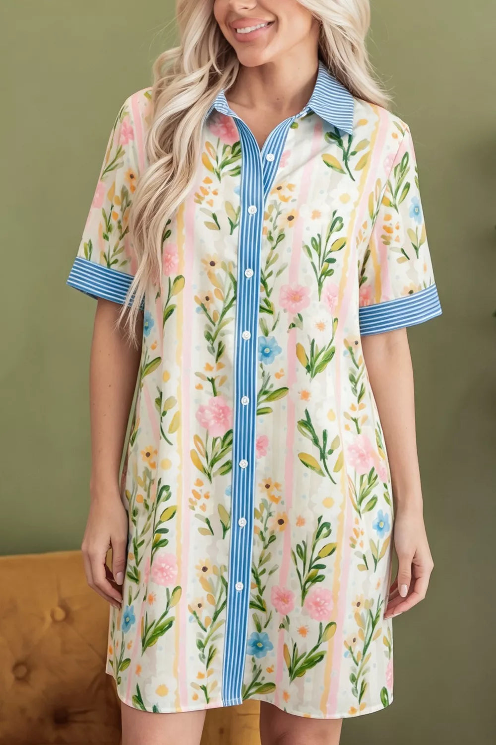 Floral print shift dress with button-down front, striped accents, and above-the-knee length.