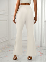 Ivory tailored flare trousers with a split hem detail.