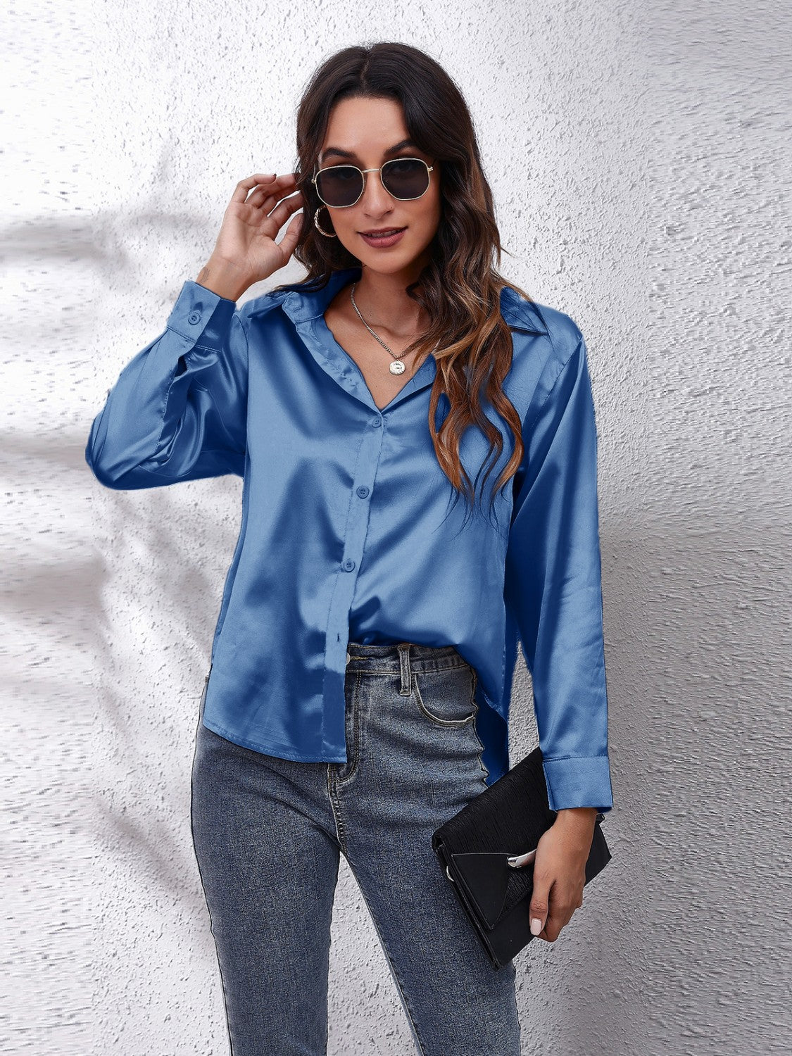 Peacock blue satin button-up shirt with a relaxed fit and collared neckline.