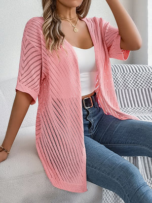 Pink open-knit slouchy cardigan with short sleeves and chevron pattern detail.