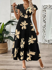 Black floral print midi dress with cap sleeves and a V-neckline.