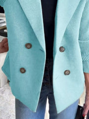 Pastel blue double-breasted knit sleeve outerwear with brown buttons and a lapel collar.