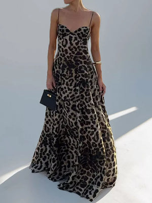 Leopard print maxi swim dress with sweetheart neckline and spaghetti straps.