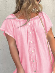 Pink off-shoulder denim dress with frayed hem, button front, and short sleeves.