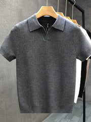 Grey textured knit short sleeve polo shirt with a V-neck collar.