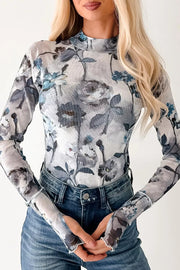 Sheer floral high neck long sleeve shirt with blue and gray flowers.
