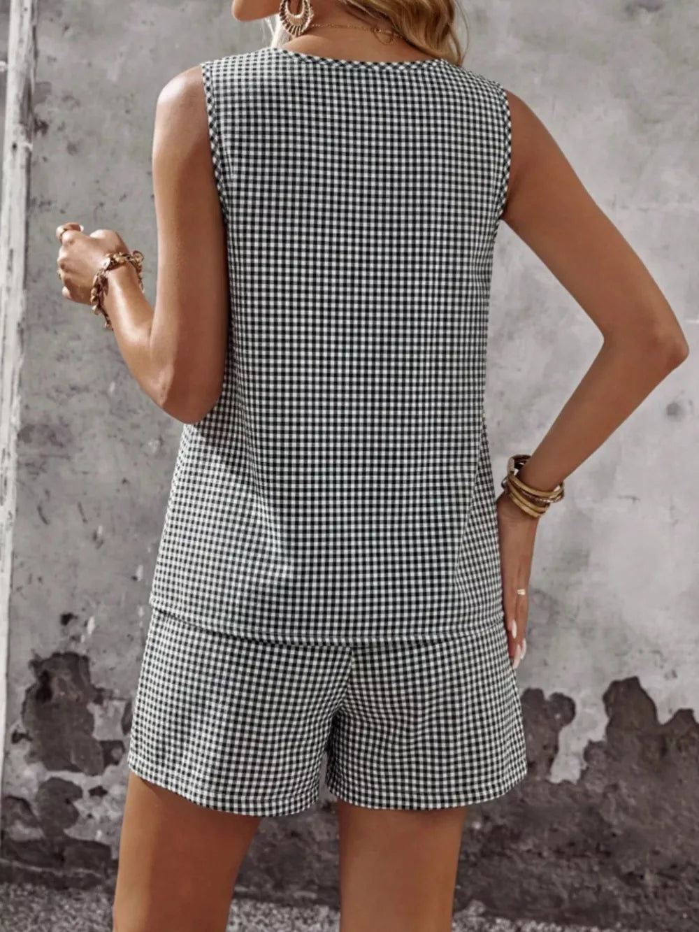 Black gingham two-piece set with button-down top and shorts.