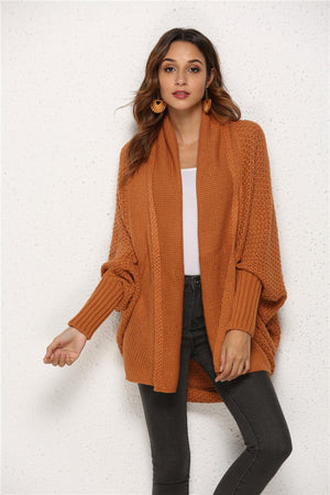 Textured cocoon knit cardigan in caramel with batwing sleeves and ribbed cuffs.