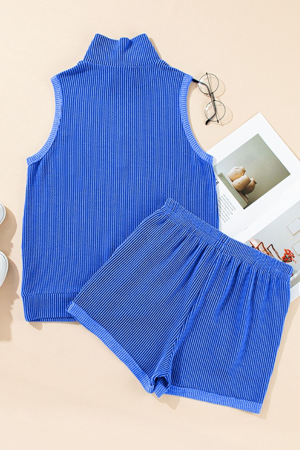 Royal blue ribbed knit sleeveless turtleneck top and drawstring shorts set