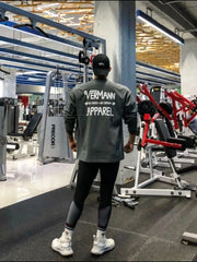 Oversized graphic tee in dark gray with "VERMANN APPAREL" text on the back.