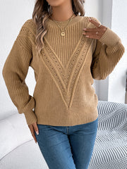 Camel chevron knit sweater with eyelet detail and crew neck.