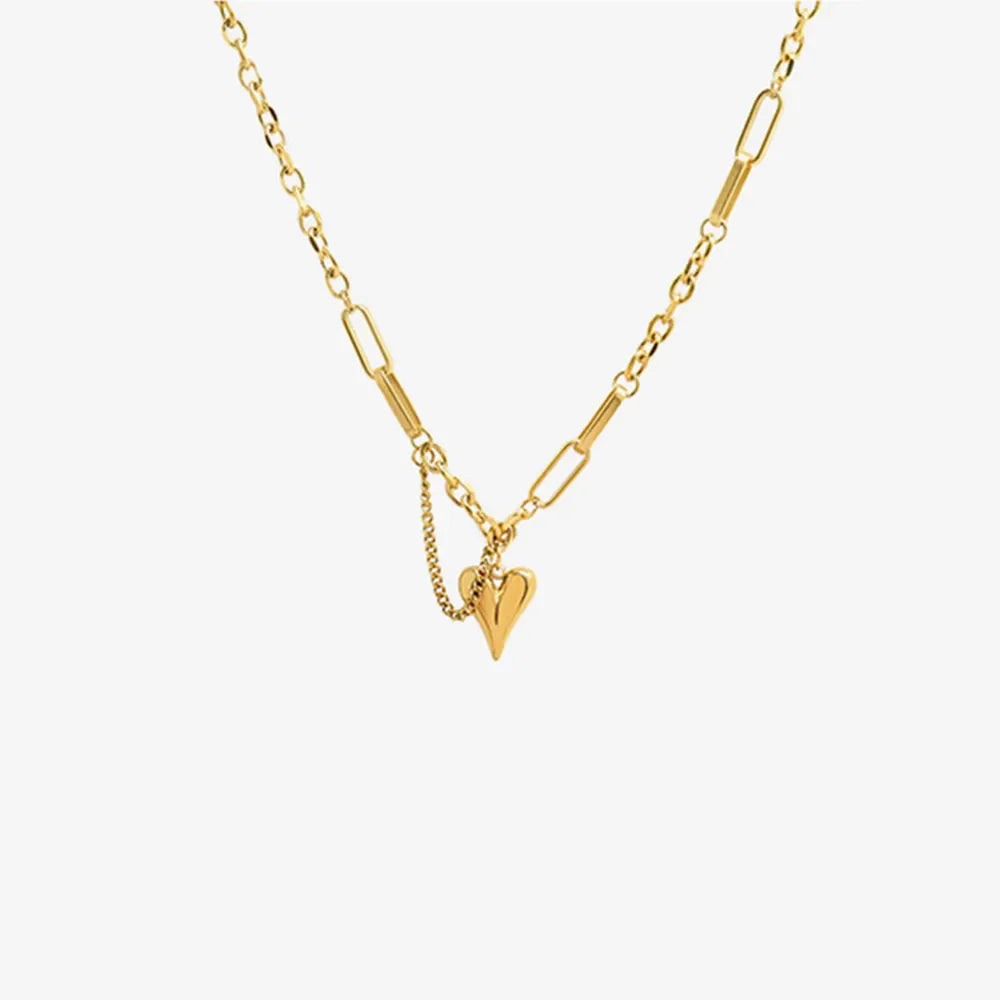 Gold heart drop chain link necklace with delicate charm detail