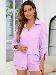 Lavender textured cotton co-ord set with relaxed fit shirt and shorts, featuring button details and roll-up sleeves.
