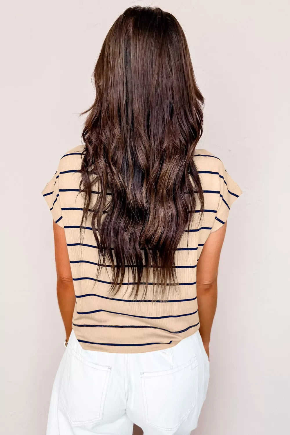 Striped mock neck t-shirt in beige with navy stripes, short sleeves, and a casual fit.