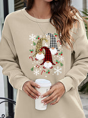 Beige crewneck sweatshirt tunic with festive gnome graphic and holiday accents.