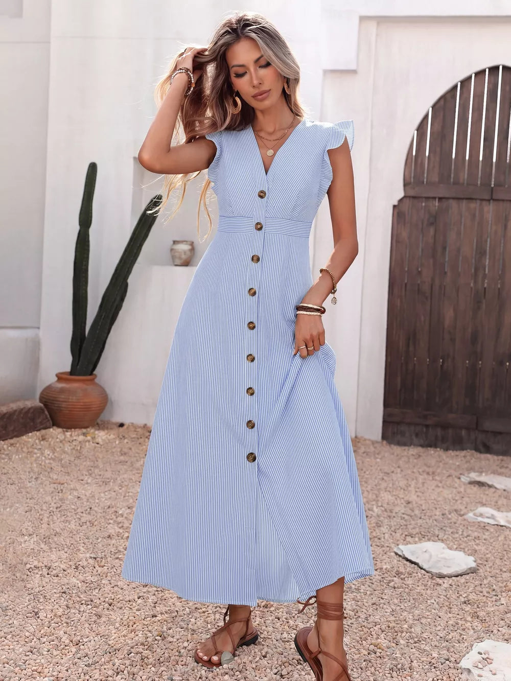 Blue striped midi dress with ruffled sleeves and button front