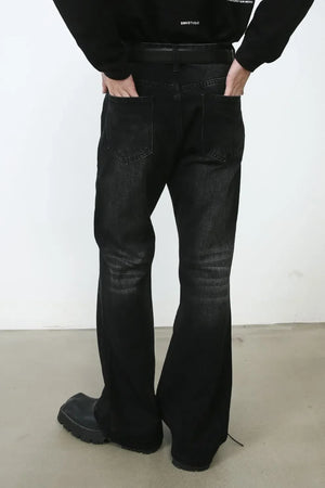 Black faded flare denim jeans with a casual, chic style.